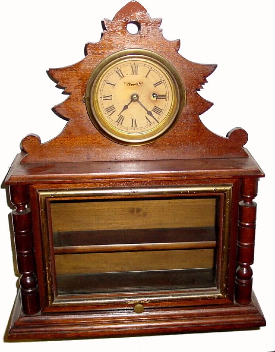 C.1870, W. O. Corning and Brown, New York, perfume display case with clock — Antique Clocks Price Guide