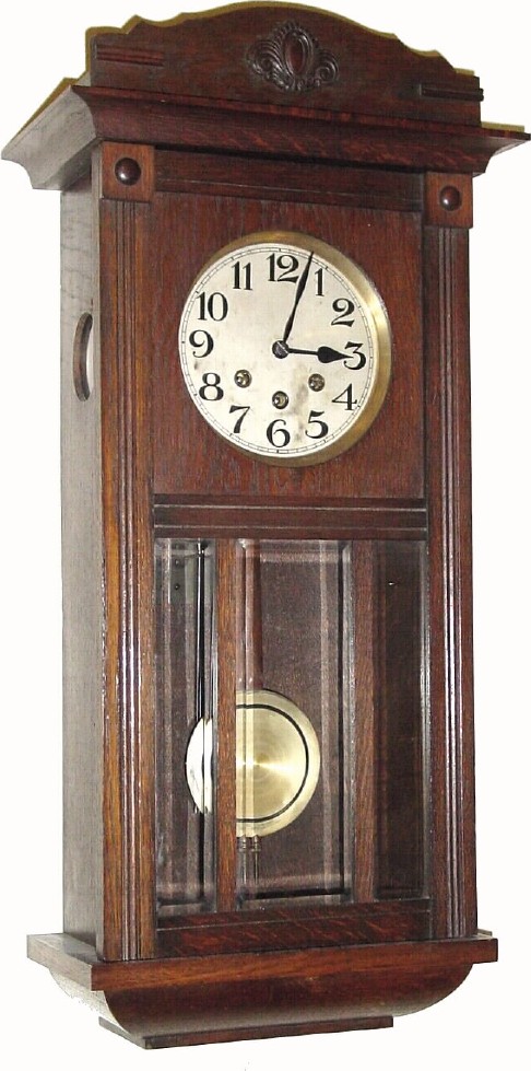 C.1920, German, Westminster Box clock in oak and in very good original condition. — Antique Clocks Price Guide