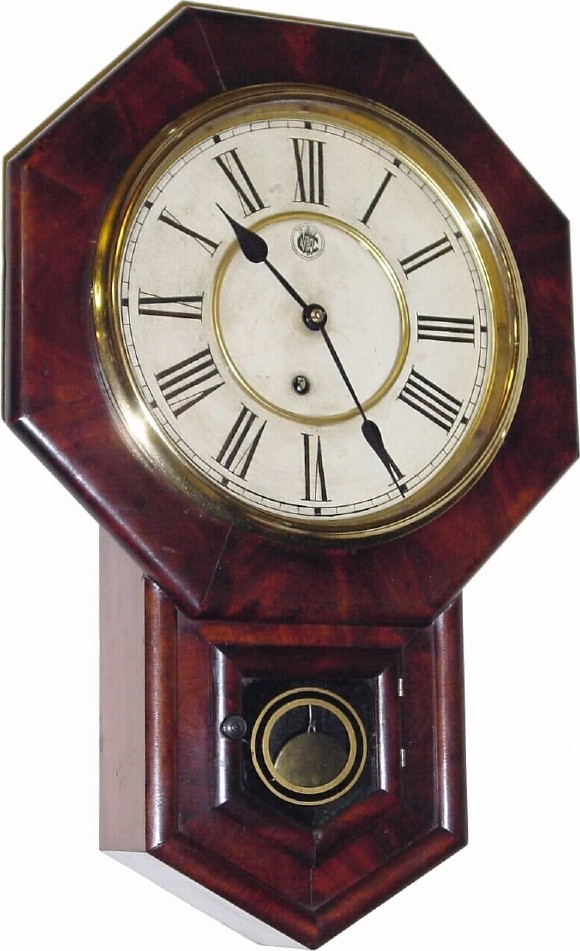 C.1895, Waterbury Clock Co., "Drop Octagon, 10 Inch" 8-day mahogany veneer timepiece, in excellent original condition. — Antique Clocks Price Guide