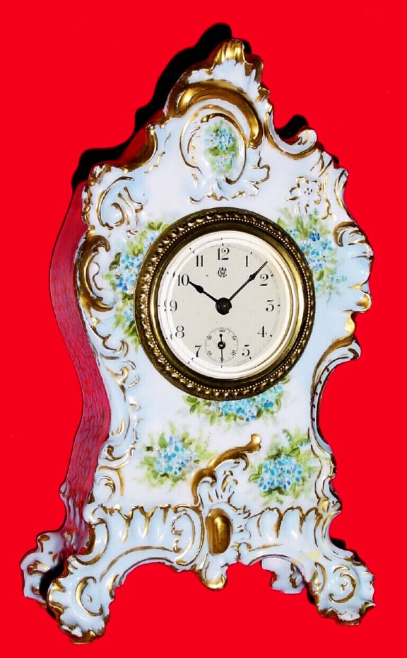 C.1905, Waterbury Clock Co., Waterbury, CT, 30-hour backwind miniature china case novelty, as-found with repairs. — Antique Clocks Price Guide