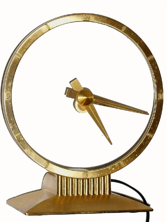 C.1955, Jefferson Electric Co., Bellwood, IL, "GOLDEN HOUR" 110 volt mystery clock — Antique Clocks Price Guide