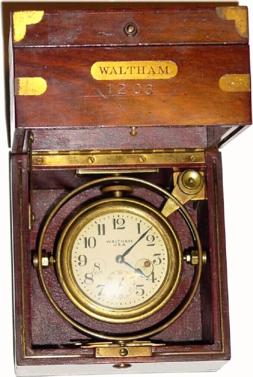 C.1930, Waltham Clock Co., 8-day Deck Watch housed in a mahogany display top gimbaled case, — Antique Clocks Price Guide