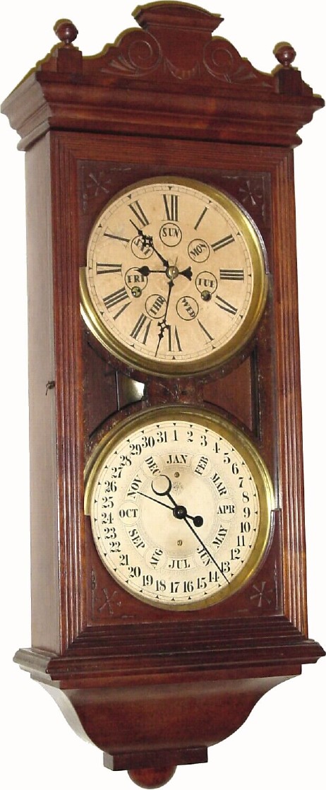 C.1908, Waterbury Clock Co., "Calendar No. 25" 8-day time and perpetual calendar in a quartered oak case, in very good condition. — Antique Clocks Price Guide