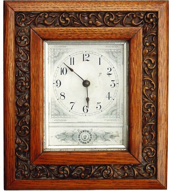 C.1900, Werner Clock Mfg Co., unusual oak picture frame clock in excellent original condition. — Antique Clocks Price Guide