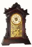 C.1885, Terry Clock Co., Pittsfield, Mass, uncommon COTTAGE model walnut gingerbread clock in excellent original condition. — Antique Clocks Price Guide