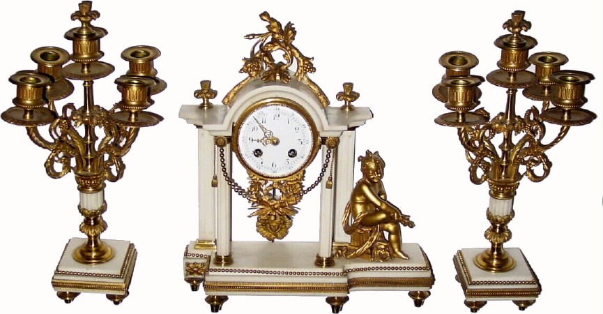 C.1870, French, Japy, White Marble and Bronze mantel clock set, with an interesting child actor with a Mercury head-dress, and his/her mask laying on the ground. — Antique Clocks Price Guide