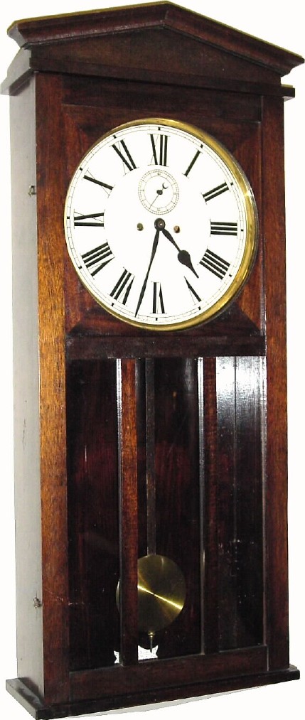 C.1914, Waterbury Clock Co., "Regulator No. 82" in mahogany, and in excellent original condition. — Antique Clocks Price Guide