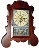 C.1853, E. and A. Ingraham 30-hour time/alarm miniature lyre front shelf clock.