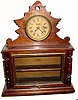 C.1870, W. O. Corning and Brown, New York, perfume display case with clock