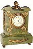 C.1900, French, for Maple and Co., Ltd., a green onyx and ormolu boudoir clock.