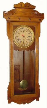 C.1881, New Haven Clock, for the American Wringer Co., "American Regulator 8-day T.P. Calendar" in oak (time and calendar). — Antique Clocks Price Guide