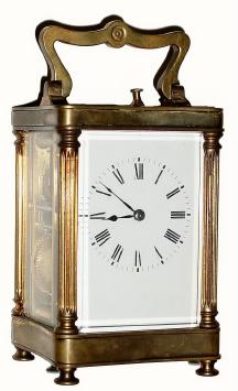 C.1910, French Brass Cased Carriage clock, in a columns case with serpentine top and bottom. — Antique Clocks Price Guide