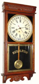 C.1907, E. Ingraham and Co., "Western Union", 8-day time and calendar wall clock in very good original condition. — Antique Clocks Price Guide