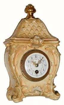 C.1900, French porcelain timepiece with handsome Rococco case and gilt brass finial. — Antique Clocks Price Guide