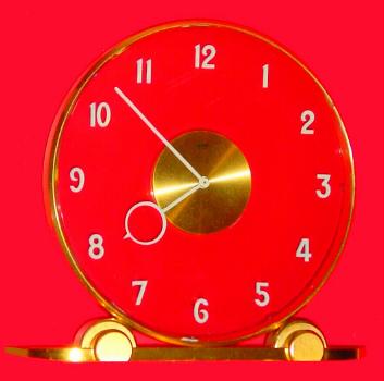 C.1965, Swiss, Imhof Novelty clock with heavy glass dial. — Antique Clocks Price Guide
