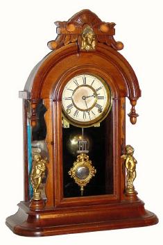 C.1876, Bridgeport Brass Co., Bridgeport, Conn., rare 8-day time and strike, walnut mirror-side clock. — Antique Clocks Price Guide