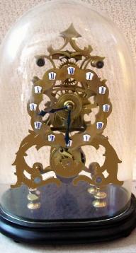 C.1890, English, 8-day fusee skeleton timepiece, scroll frame, with some restoration. — Antique Clocks Price Guide