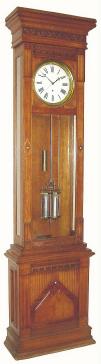 C.1900, Waterbury "Regulator No. 8" floor standing regulator in oak and in very good restored condition. — Antique Clocks Price Guide