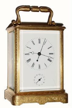 C.1880, French /Swiss, Brass cased, hour repeating carriage clock with sweep seconds hand and alarm. — Antique Clocks Price Guide