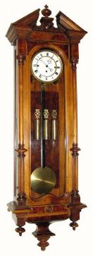 C.1880, Austrian, 3-Wt Grand Sonnerie wall clock in a walnut case with reeded half columns with Corinthian capitals, — Antique Clocks Price Guide