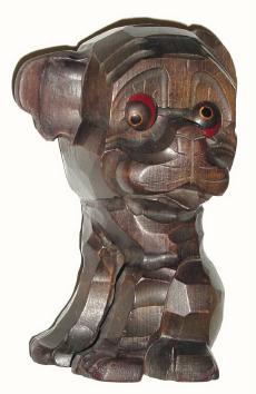 C.1930, German "Oswald", Carved dog rolling eye novelty. 30-hour backwind timepiece movement with rolling eyes that indicate the time. — Antique Clocks Price Guide