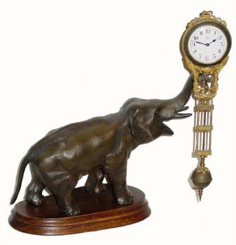 C.1910, German, Junghans, Novelty ELEPHANT Swing Clock, bronzed spelter statue with ormolu frame to clock, and in outstanding original condition. — Antique Clocks Price Guide