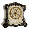 C.1898, F. Kroeber Clock Co., New York, "China No. 12" 8-day time and strike porcelain clock, in dark forest green and white with gold accents.