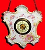 C.1910, Unknown, German-made hanging porcelain thirty-hour timepiece novelty.