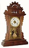 C.1895, Seth Thomas ECLIPSE walnut gingerbread clock, with restoration.