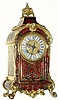 C.1915, French, for JUST, Inlaid Brass and Red Tortoise Shell clock in the style of Boulle, and in excellent original condition.