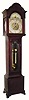 C.1910, English, Mahogany Tall Case clock with time, strike and brass dial with rolling moon.