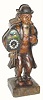 C.1925, German, Carved Wood mechanical whistler, clock peddler, with working clock in his arms, and a load of clocks on his back.
