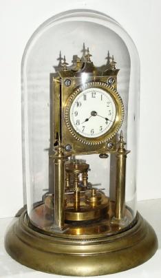 C.1920, German, Jahresuhrenfabrik, 400 Day clock with disc pendulum and small dial. — Antique Clocks Price Guide