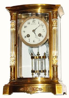 C.1900, Paris, France, for Tiffany and Co., crystal regulator with bow front and 2 cut glass columns at the side. — Antique Clocks Price Guide