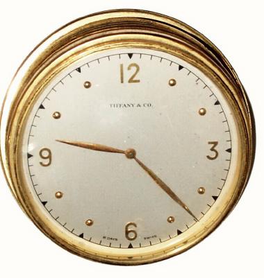 C.1960, Swiss for Tiffany and Co, 8-Day Desk clock, a round ribbed cylinder, on an angle cut base, — Antique Clocks Price Guide
