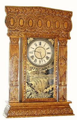C.1907, E. Ingraham and Co. 8-day time/strike pressed oak gingerbread clock, refinished. — Antique Clocks Price Guide
