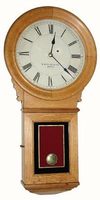 C.1920, E. Howard and Co., "Regulator No. 70", 8-day, 1-weight timepiece in golden oak, nicely refinished. — Antique Clocks Price Guide