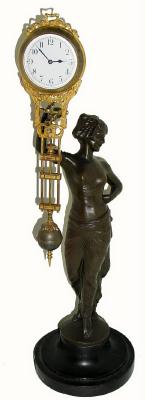 C.1910, German, Junghans, Cleopatra, 30-hour "swinging arm" timepiece in very fine condition. — Antique Clocks Price Guide