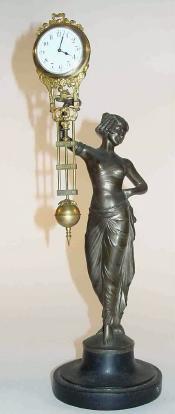 C.1910, German, Junghans, Cleopatra, 30-hour "swinging arm" timepiece in very fine condition. — Antique Clocks Price Guide