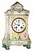 Mixed lot: C.1890, Japy Bell Strike movement, now in a French porcelain case of the same period.