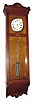 C.1900, Flint Furniture Co., New York, a large oak cased pinwheel regulator with mercury pendulum.