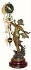 C.1895, French, Mini Patinated Spelter Swinging timepiece "Crossing the Stream" in very good original condition.