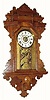 C.1890, E. Ingraham and Co., Hanging Walnut gingerbread alarm, with restoration.