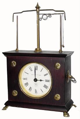 C.1969, Horolovar Co., New York, Terwilliger's reproduction of the famous "Ignatz" flying pendulum timepiece. — Antique Clocks Price Guide