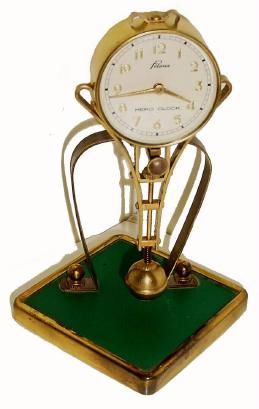 C.1960, Japan, Meiko Clock Co., Paloma swinging arm clock in good original condition. — Antique Clocks Price Guide