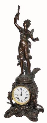 C.1900, Mixed lot: An Ansonia Fleur de Lys base (sometimes called blossom base), — Antique Clocks Price Guide
