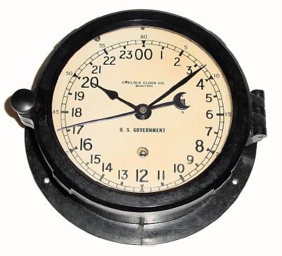 C.1965, Chelsea Clock Co., Boston, Marine lever timepiece, with 24 hour dial and center seconds hand, in a black Bakelite case. — Antique Clocks Price Guide