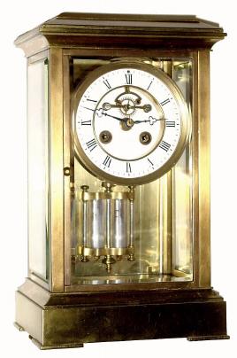 C.1900, French, 8-day time/strike crystal regulator, with open escapement on the sunken porcelain dial. — Antique Clocks Price Guide
