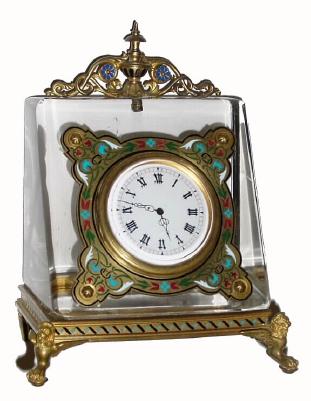 C.1900, Swiss, Ladies Desk Clock, polished crystal polygon with ormolu feet in the shape of winged lions, with a key wind bar type 30 hour watch movement. — Antique Clocks Price Guide