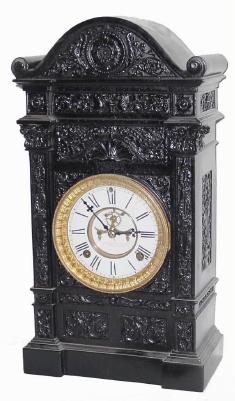 C.1885, Ansonia, MARBELITE No. 5, painted black, and with a couple of cracks on the porcelain dial, but otherwise complete and sound. — Antique Clocks Price Guide